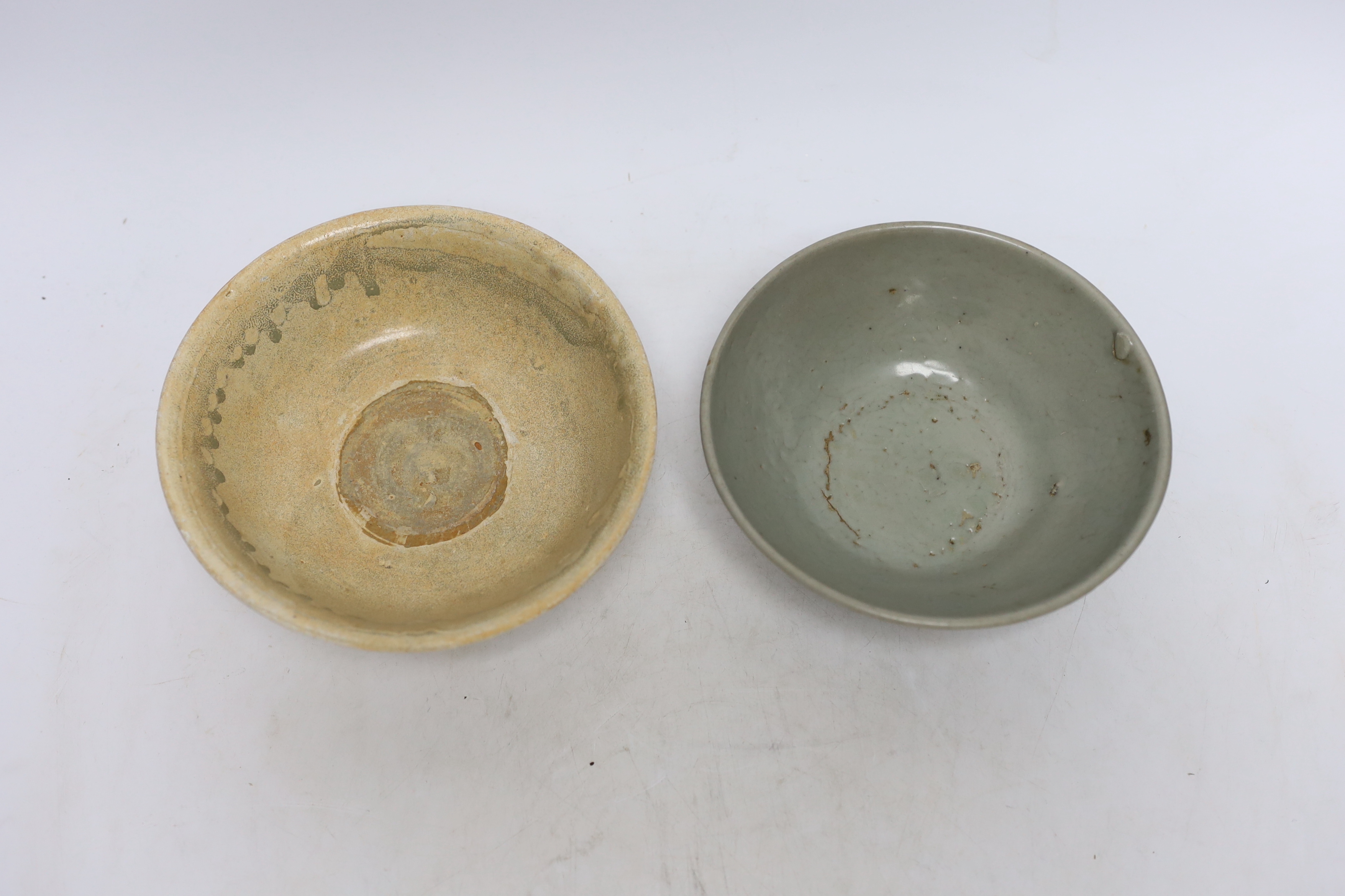 A Chinese Ming blue and white bowl and a celadon bowl, Song dynasty